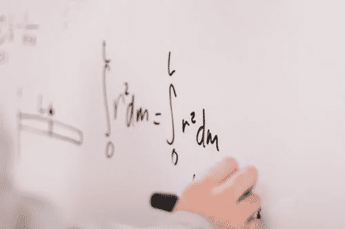  Math equation written on a whiteboard