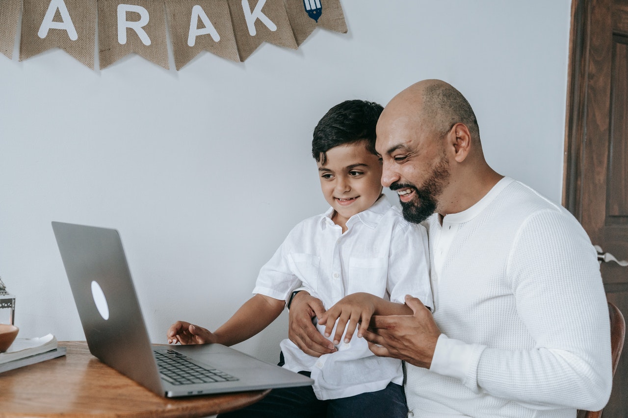 father teaching son about money 