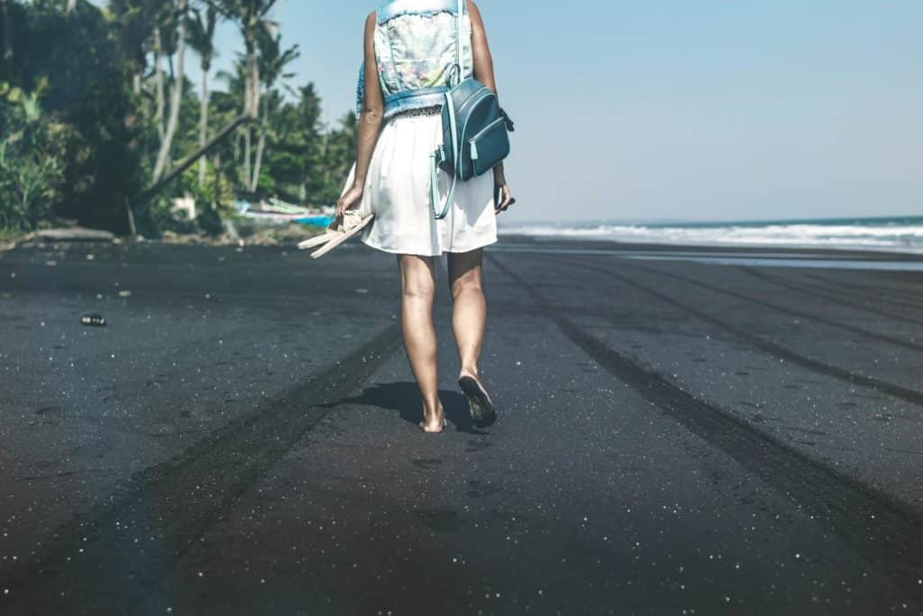 teen walking with no shoes