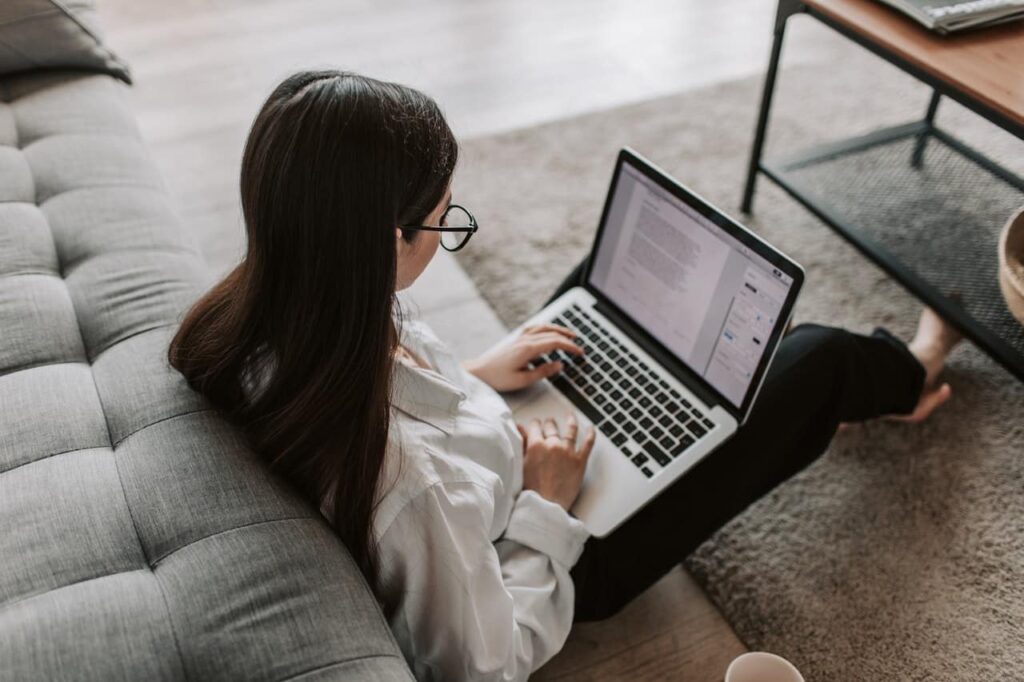 young teen working on a homework assignment at home