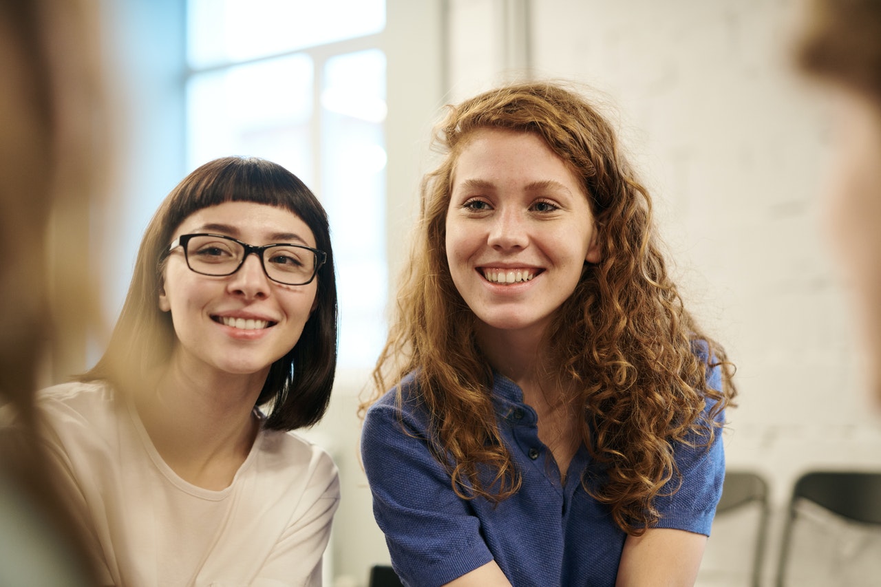 two students socializing in class 