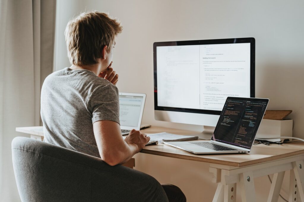 a young business owner monitoring his website