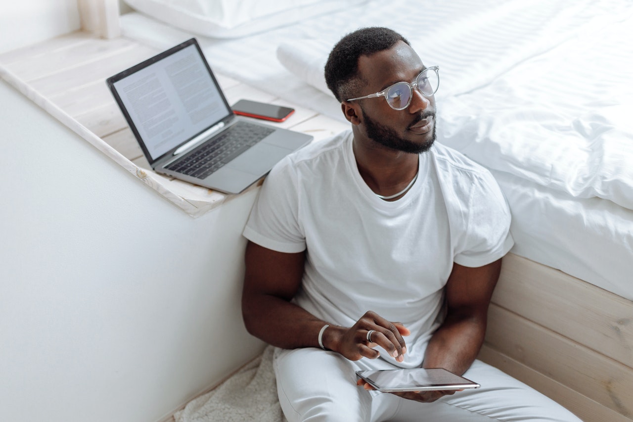 A Man in White Crew Neck T-shirt Wearing Eyeglasses 